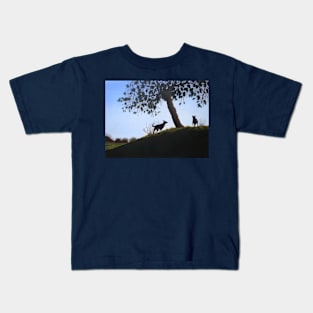 cone tree on hillside with dogs playing Kids T-Shirt